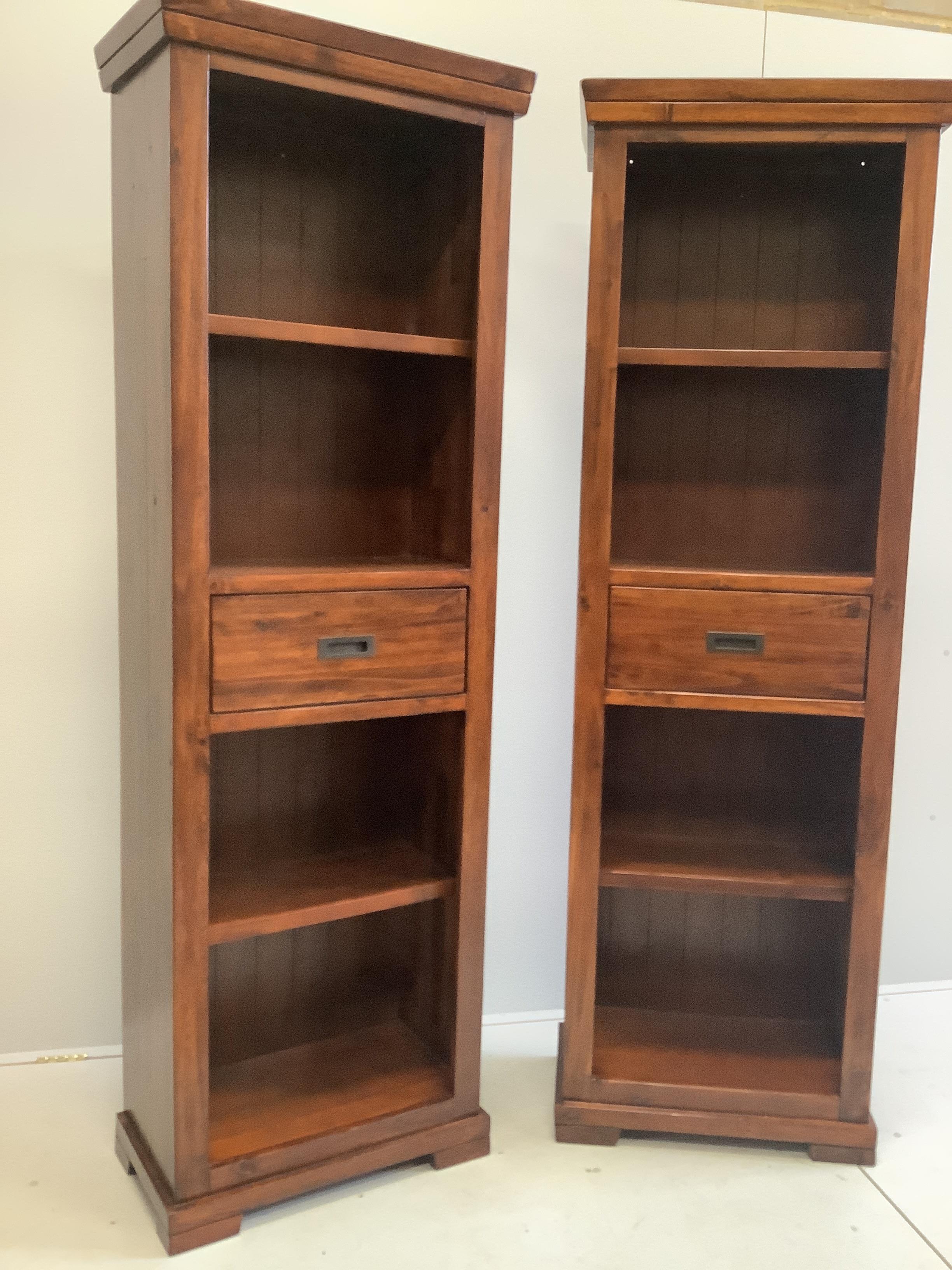 A pair of reproduction hardwood narrow open display cabinets, width 84cm, depth 36cm, height 200cm